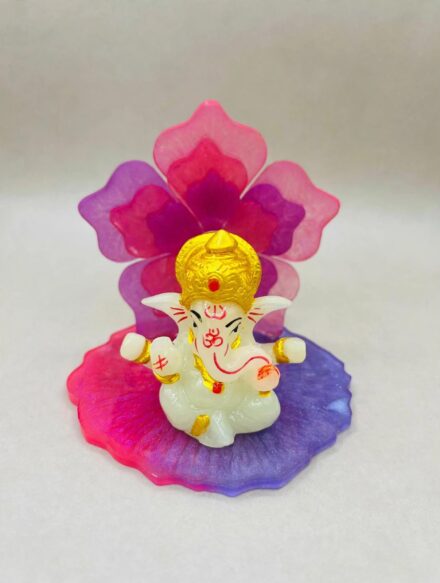 Ganesh Ji Murti With Flower Backdrop